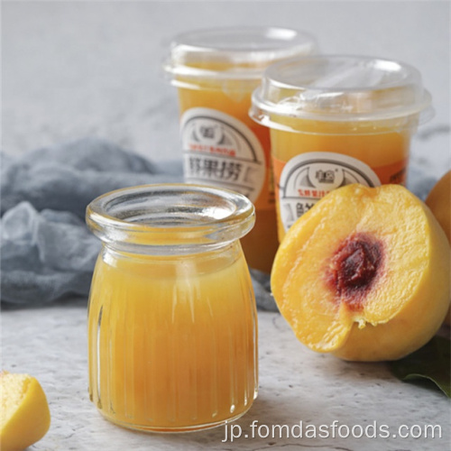 発酵マンゴージュースでさいの目に切った黄色の桃